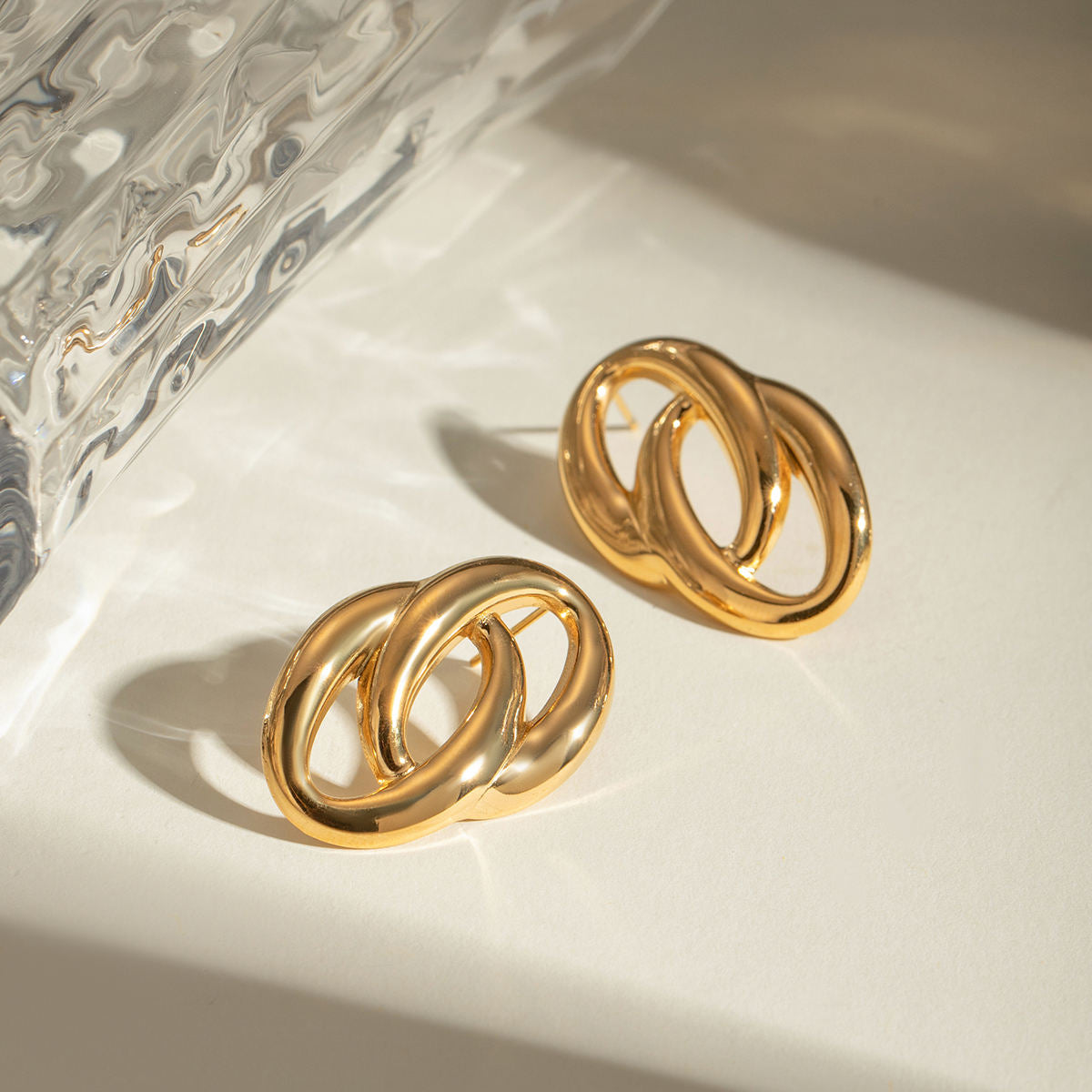 Elsa Plated Round Interlocking Stud Earrings