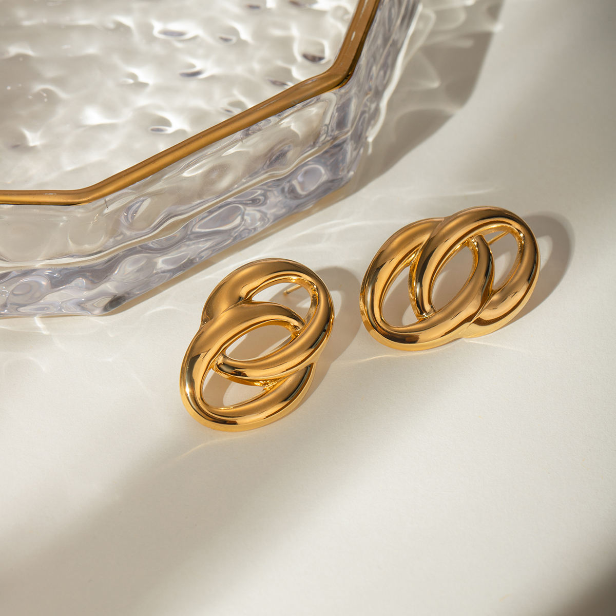 Elsa Plated Round Interlocking Stud Earrings